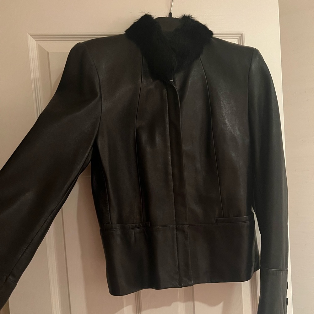 Leather jacket with fur collar trim